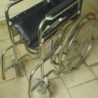 Sedia a rotelle spinta per disabili GIMA
