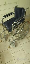 Sedia a rotelle spinta per disabili GIMA