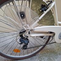 City bike con cestino e seggiolino bimbi