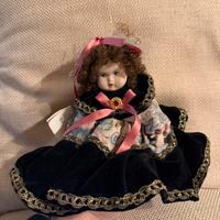 Bambola da collezione in porcellana