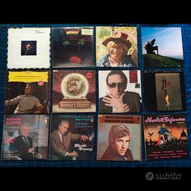 Collezione vinili 33 giri e 45 giri anni 60 70 80