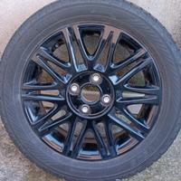4 Cerchi in lega neri R15 completi di gomme inv.