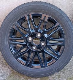 4 Cerchi in lega neri R15 completi di gomme inv.