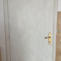 4 porte in legno verniciate di bianco