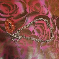 bracciale con bacio rosso
