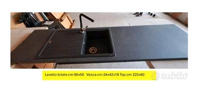 lavandino, rubinetto e top