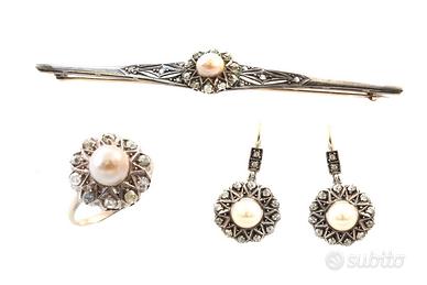 Parure composta da anello, paio orecchini e spilla