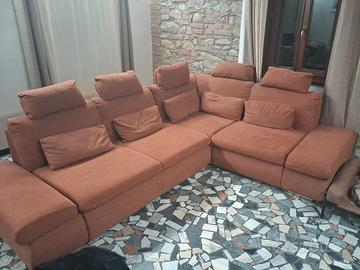 Divano letto con penisola,cuscini e poggiatesta