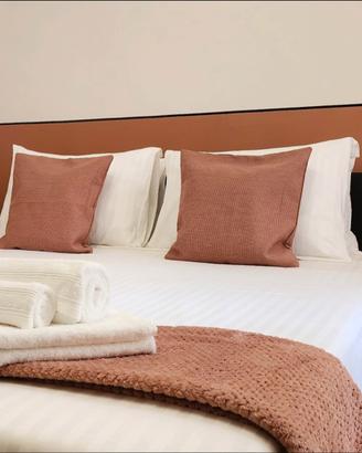 Plaid in pile e 2 cuscini arredo color rosa cotto