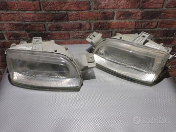 fanali anteriori con frecce fiat punto 1' serie
