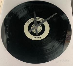 Orologio da parete in vetro effetto vinile – 33 cm