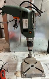 Banco con trapano, piu trapano rosso e smeri