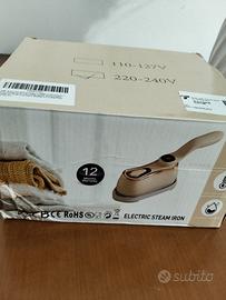 ferro da stiro a vapore per vestiti