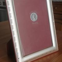 Cornice in legno e argento 