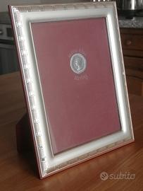 Cornice in legno e argento 