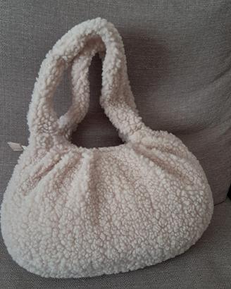 borsa in tessuto chiaro effetto pelliccia