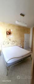 Letto matrimoniale in ferro battuto