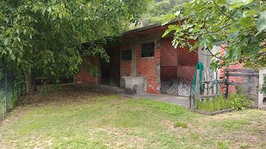 Garage e terreno a borgone