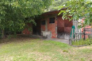 Garage e terreno a borgone