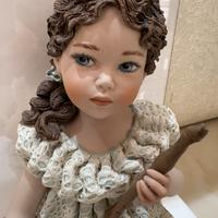 Bambola in porcellana Sibania Gaia cm22