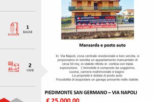 Appartamento mansardato in centro con posto auto