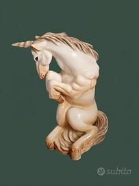 collezione statuetta Cacciapuoti