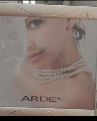 Cornice in argento Arde'