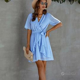 Vestitino a pois con cintura e bordo con volant