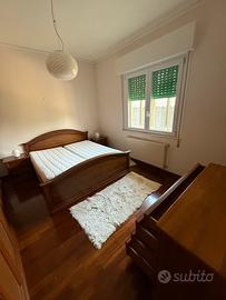 Camera da letto in legno massello