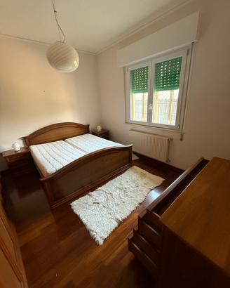 Camera da letto in legno massello