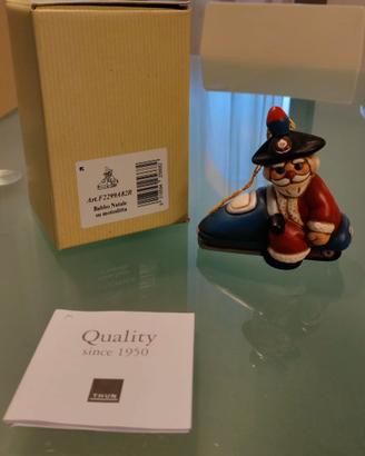 Thun Babbo Natale su motoslitta