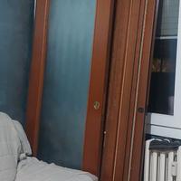 Porta scorrevole in legno con vetro satinato