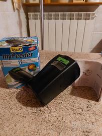 Distributore automatico mangime pesci 