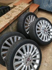 4 cerchi grigi completi grande punto 205/45/17