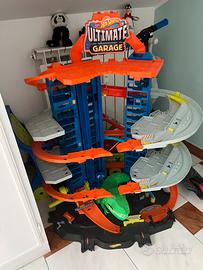 Pista hot wheels ultimate garage dinosauro