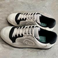 Sneakers in pelle da uomo bianche e nere