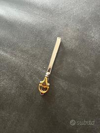 Fermacravatta Gucci