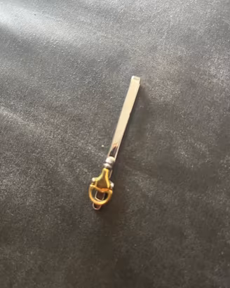Fermacravatta Gucci