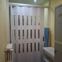 porta a soffietto pvc con vetri sopra 