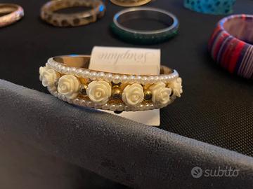 Bracciale e orecchini rose