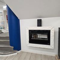 camino a legna sospeso