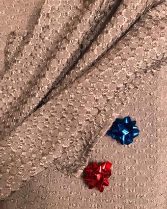 Copriletto matrimoniale.
