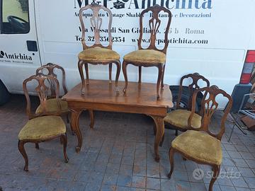 tavolo in noce con sedie