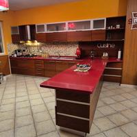 cucina in legno teak con piano okite