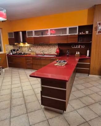 cucina in legno teak con piano okite