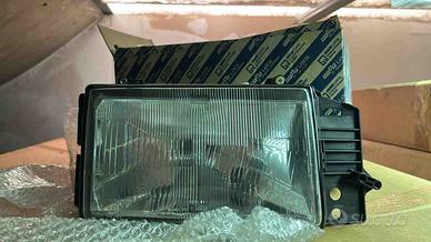 FARO DX FIAT TIPO 1988>1992 H4 CON MOTORINO ASSETT