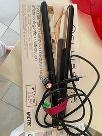 Piastra per capelli a vapore