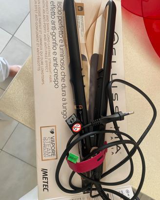 Piastra per capelli a vapore