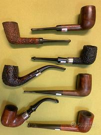 Collezione di pipe usate