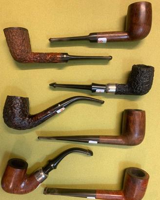 Collezione di pipe usate